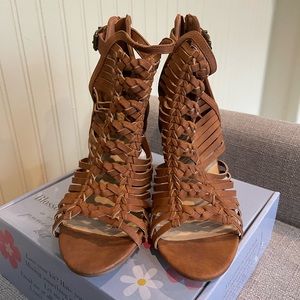 Block sandal heel never worn. Size US 8.5. Back zip up